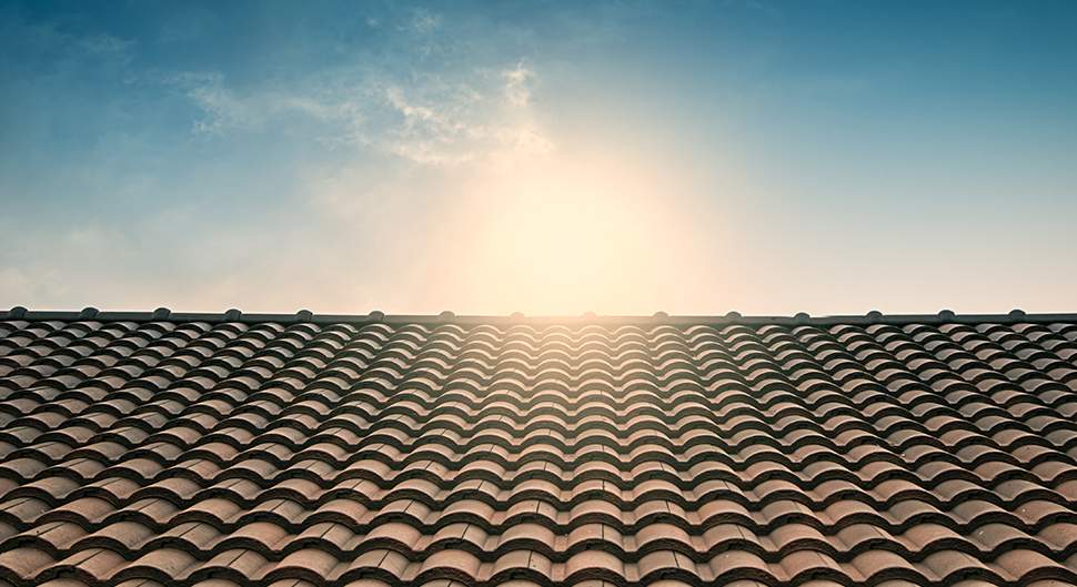 Couverture toiture à Genève : comment se préparer aux changements climatiques ?